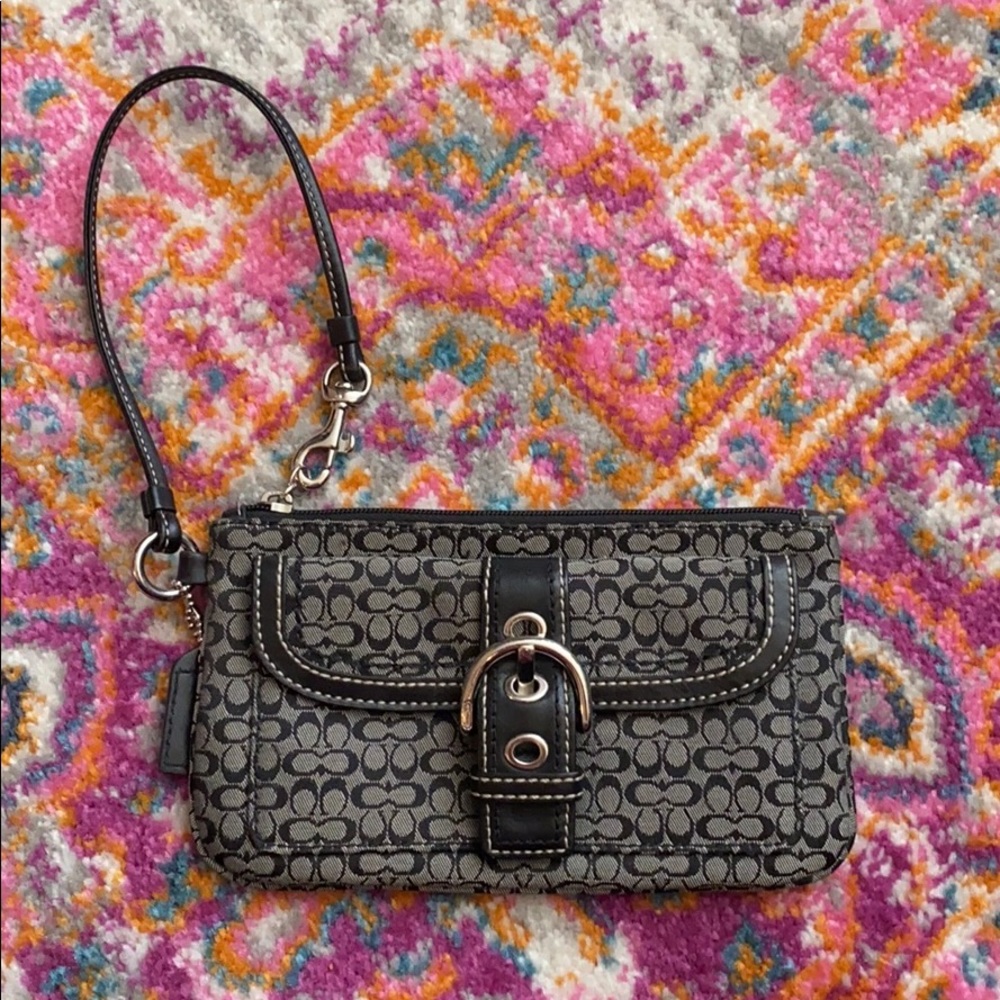 Coach wristlet in signature canvas